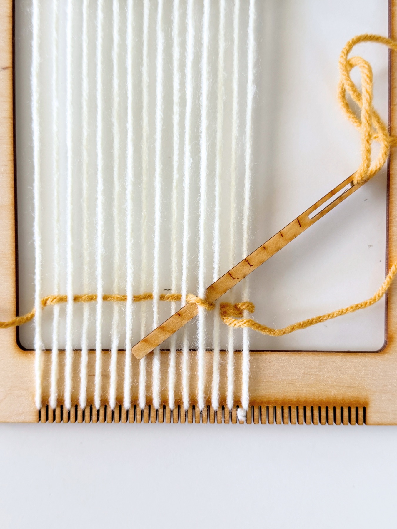 twining stitch to start the coaster web