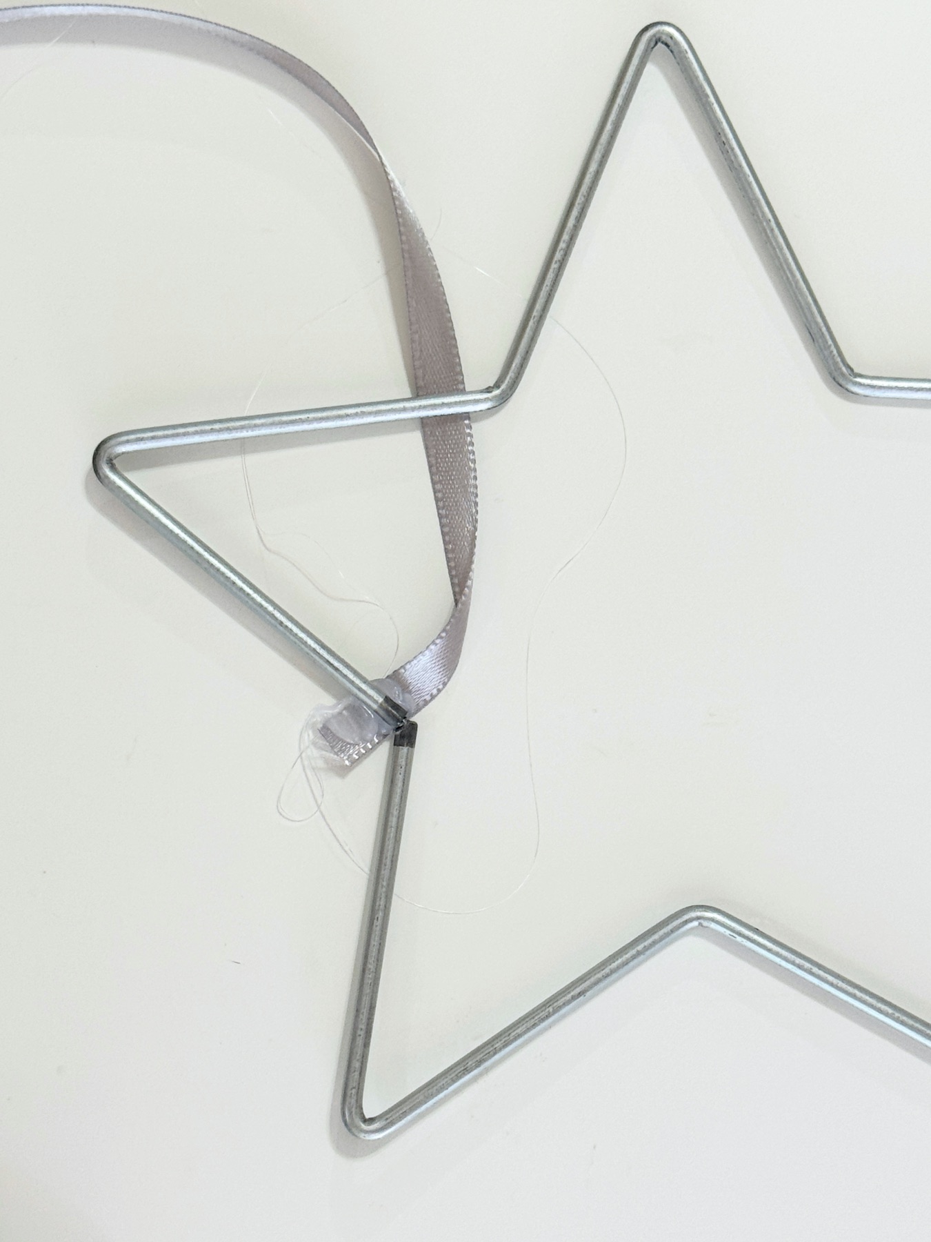 winding the ribbon around the star web