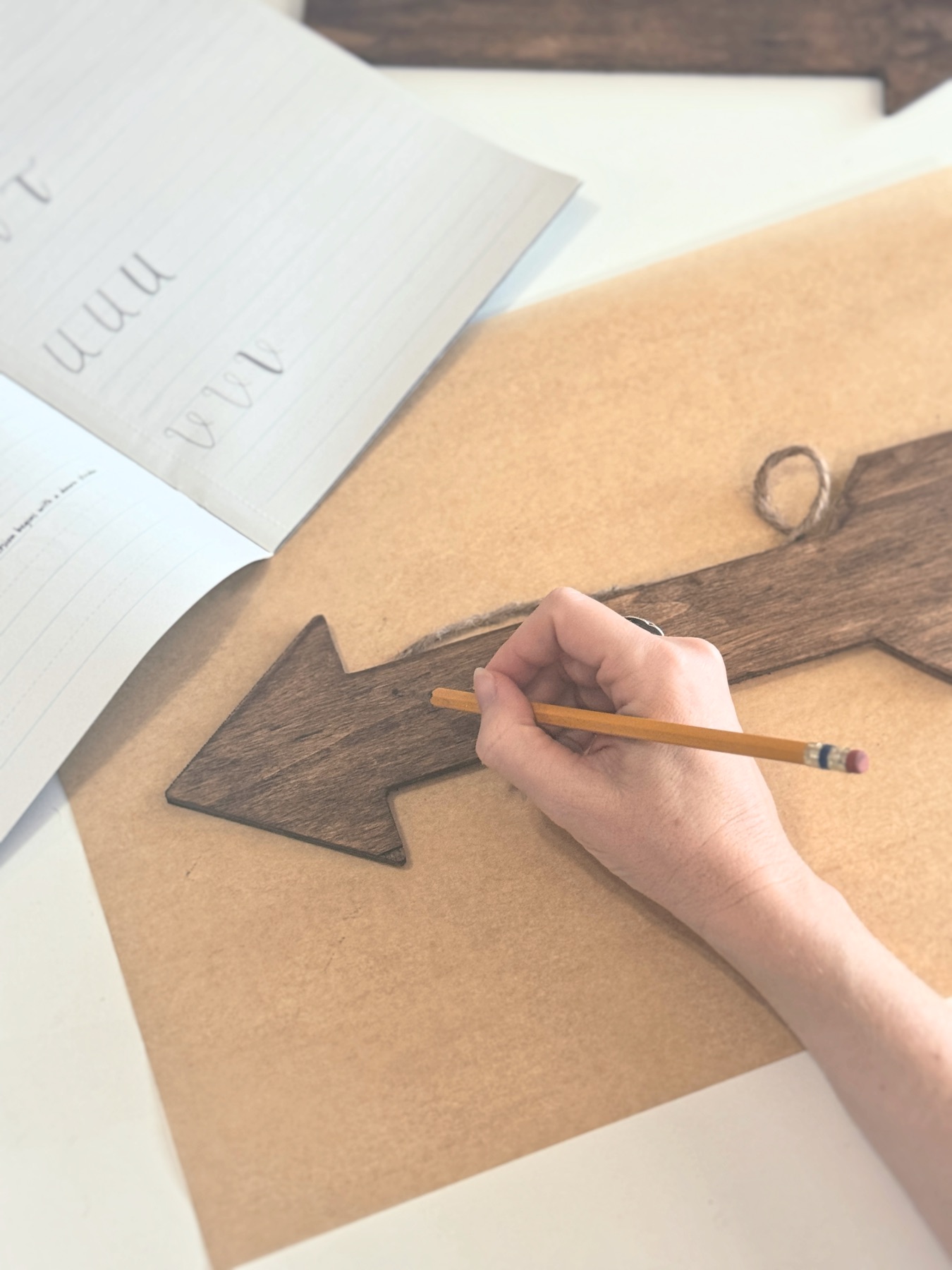 pencil the lettering on the arrow diy