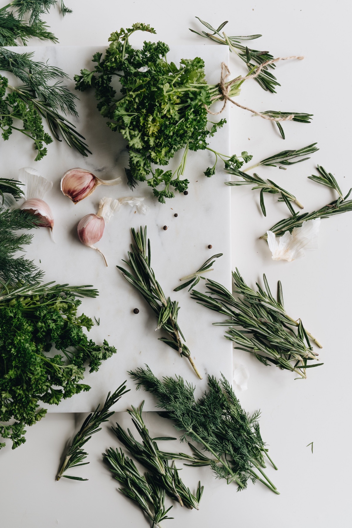 bundling herbs to make dried herbs