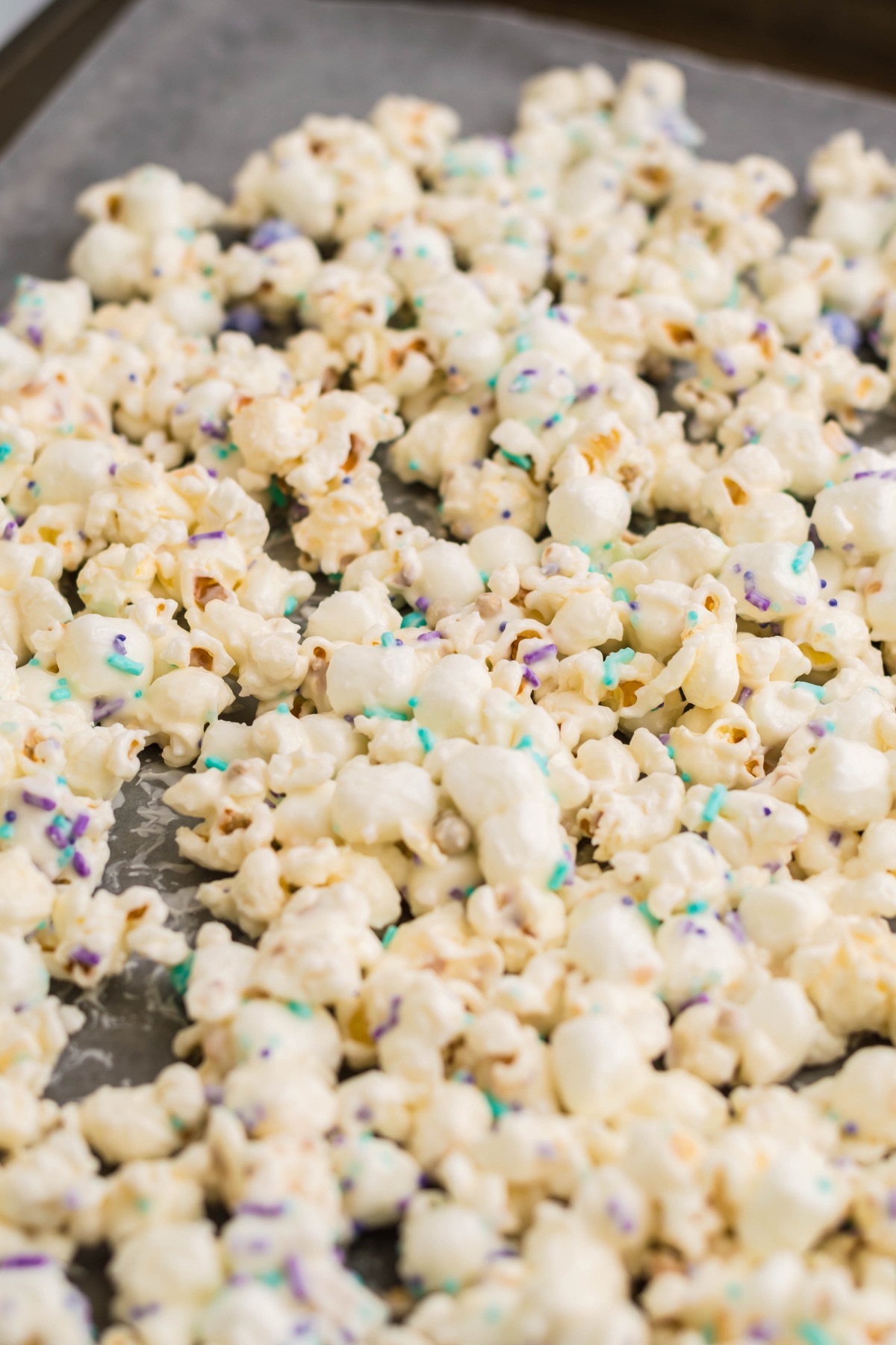 place the popcorn on a baking sheet