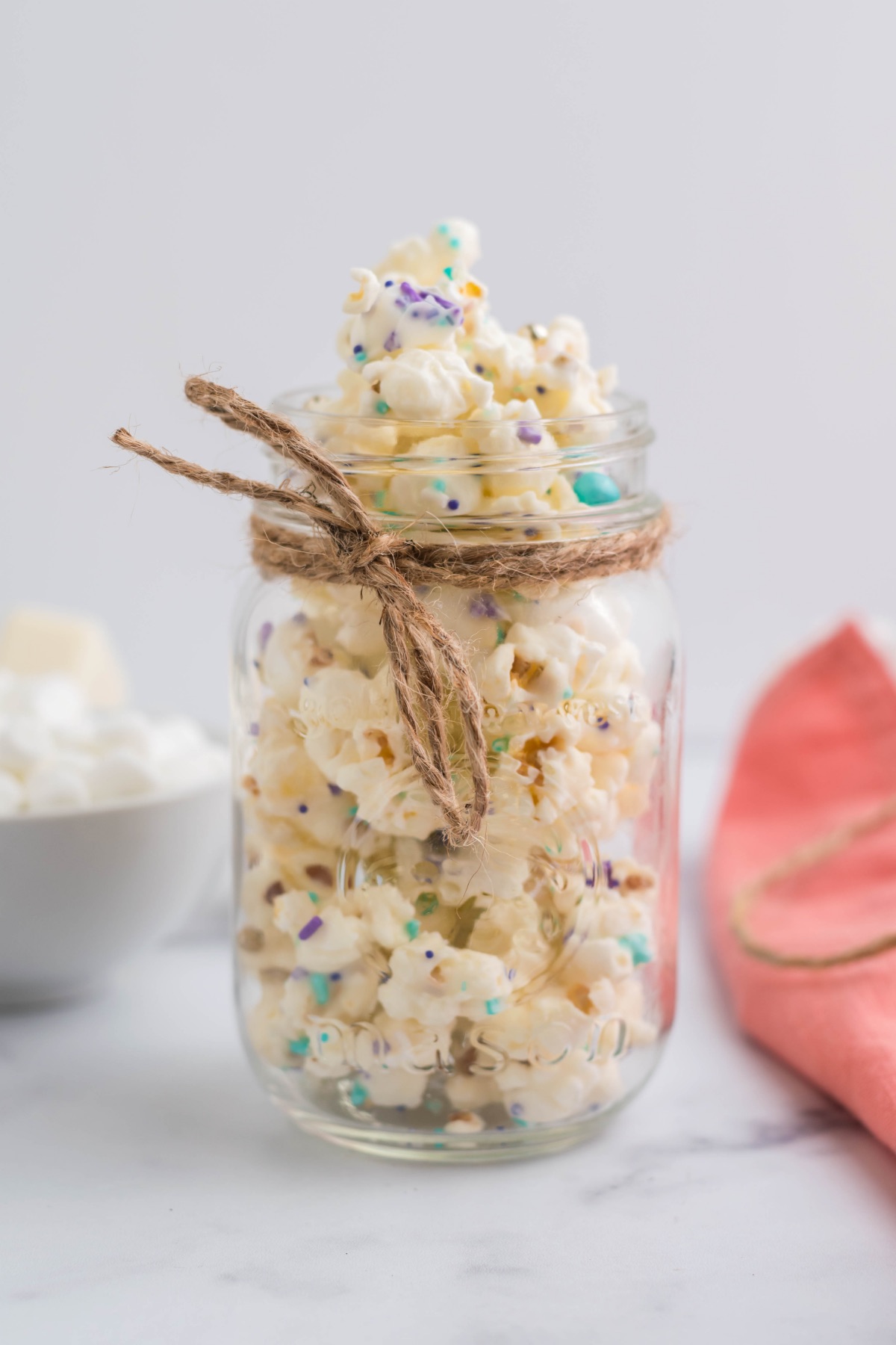 white chocolate mermaid popcorn in a jar